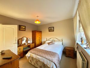 Bedroom One- click for photo gallery